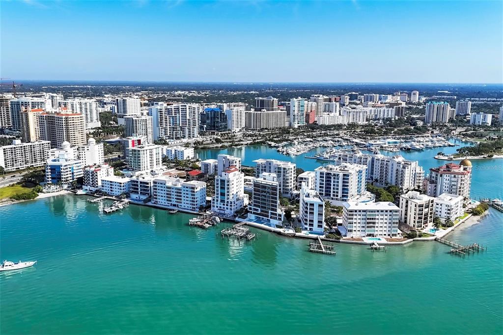 226 Golden Gate Point, Unit 32 Sarasota, FL 34236 - Photo 51 of 60 a view of a city with tall buildings and ocean view