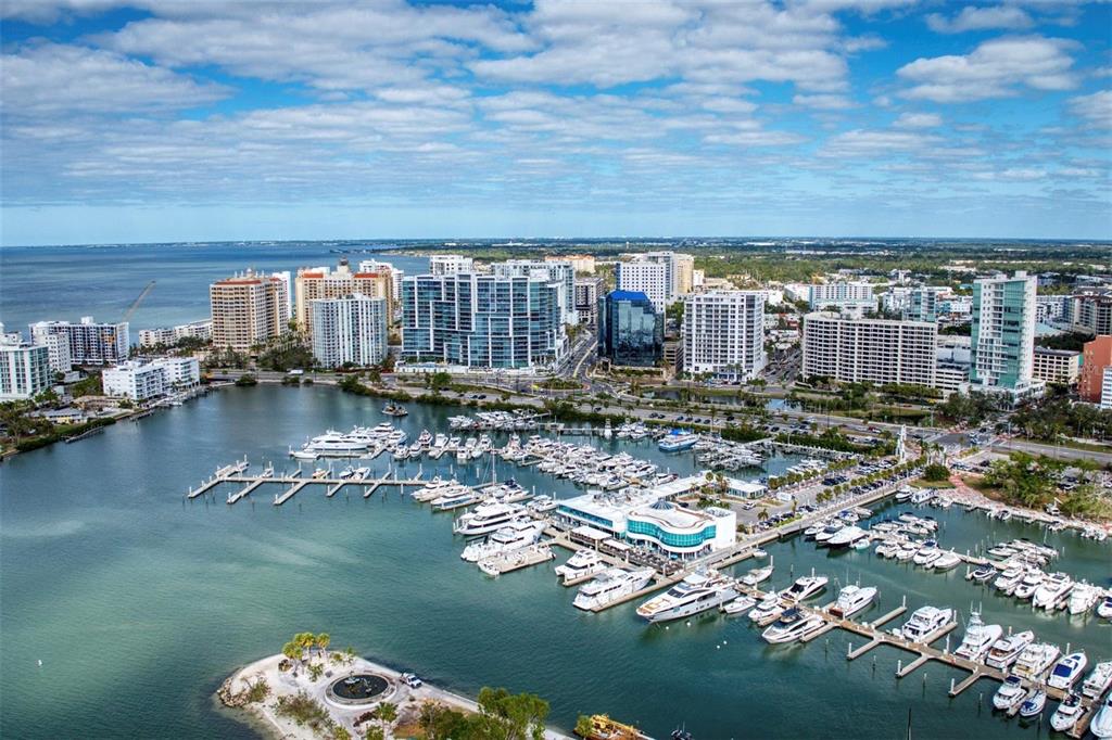 226 Golden Gate Point, Unit 32 Sarasota, FL 34236 - Photo 58 of 60 a view of a lake with a city