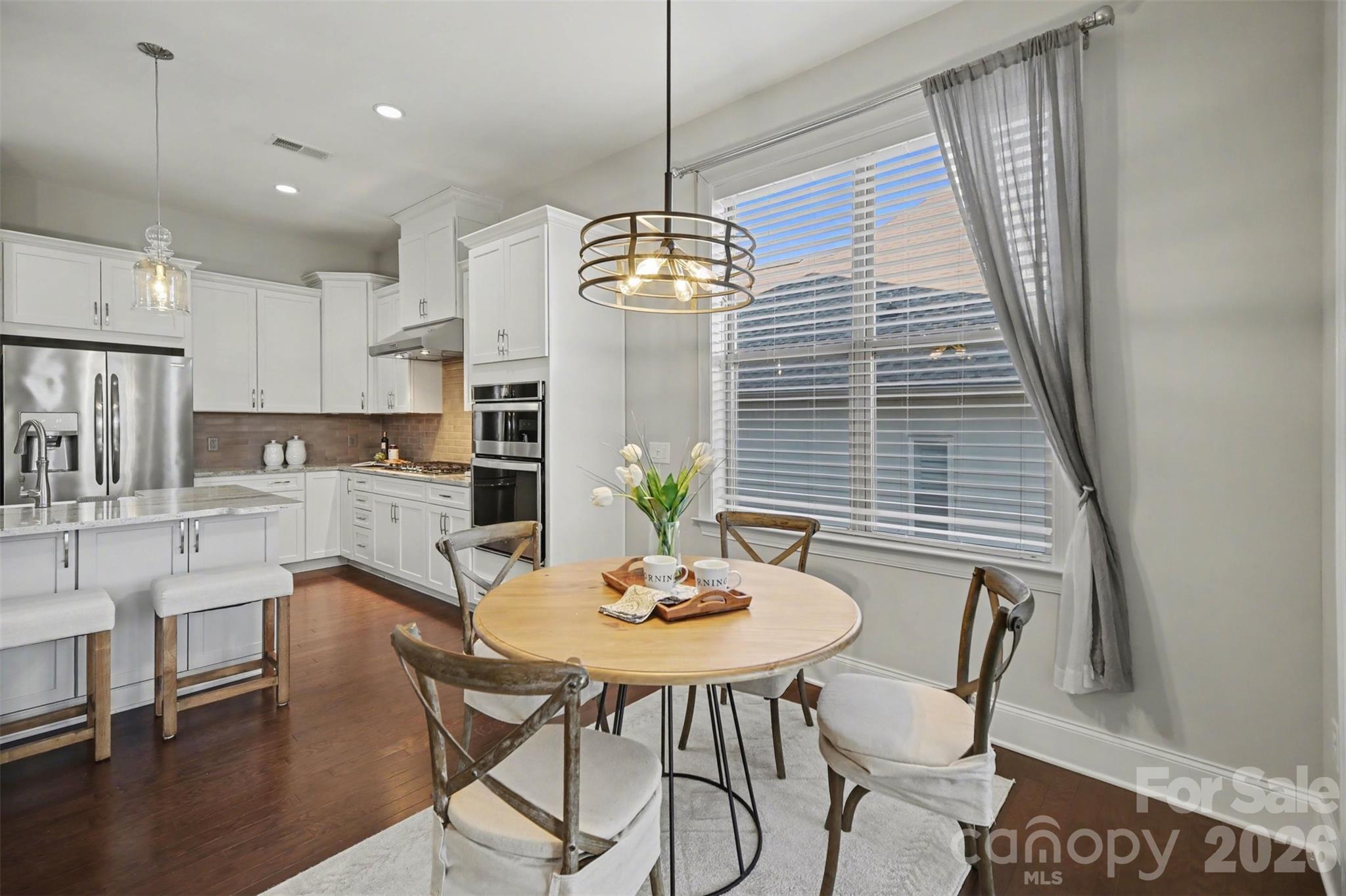 15828 Vale Ridge Drive Charlotte, NC 28278 - Photo 13 of 33 a dining room with furniture and window