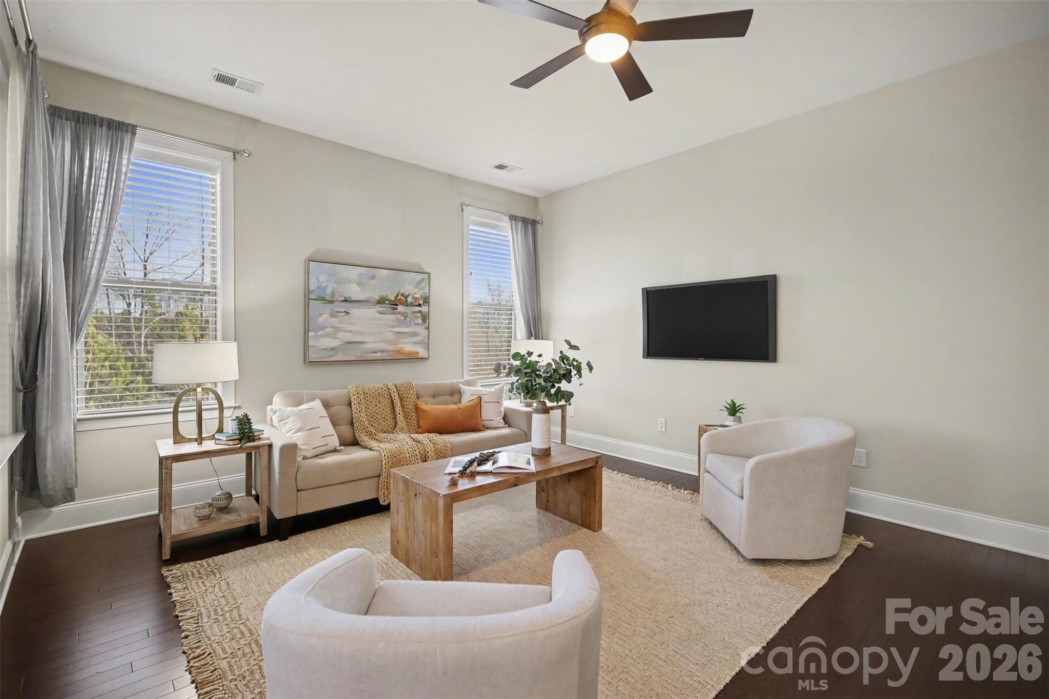 15828 Vale Ridge Drive Charlotte, NC 28278 - Photo 14 of 33 a living room with furniture and a flat screen tv