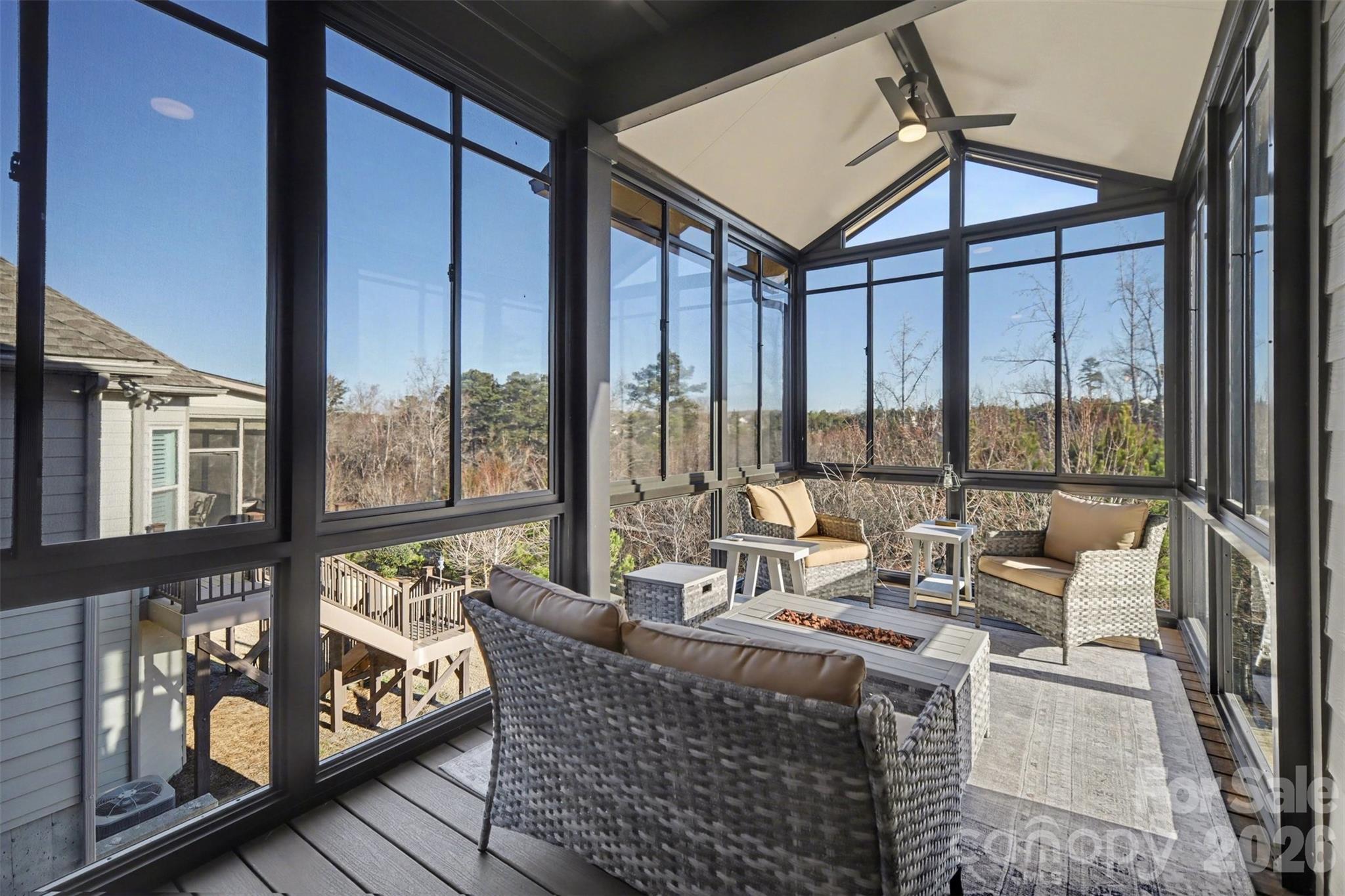 15828 Vale Ridge Drive Charlotte, NC 28278 - Photo 17 of 33 a living room with furniture and large windows