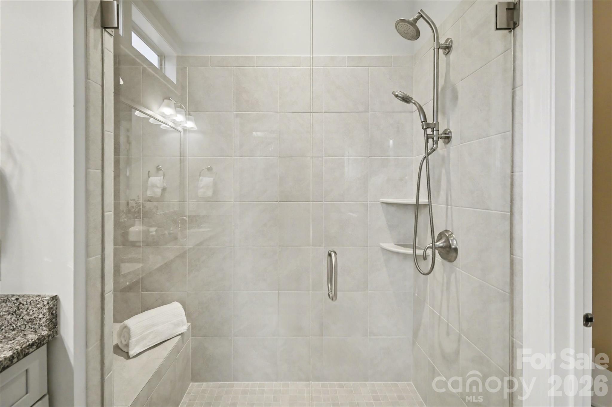 15828 Vale Ridge Drive Charlotte, NC 28278 - Photo 22 of 33 a bathroom with a shower