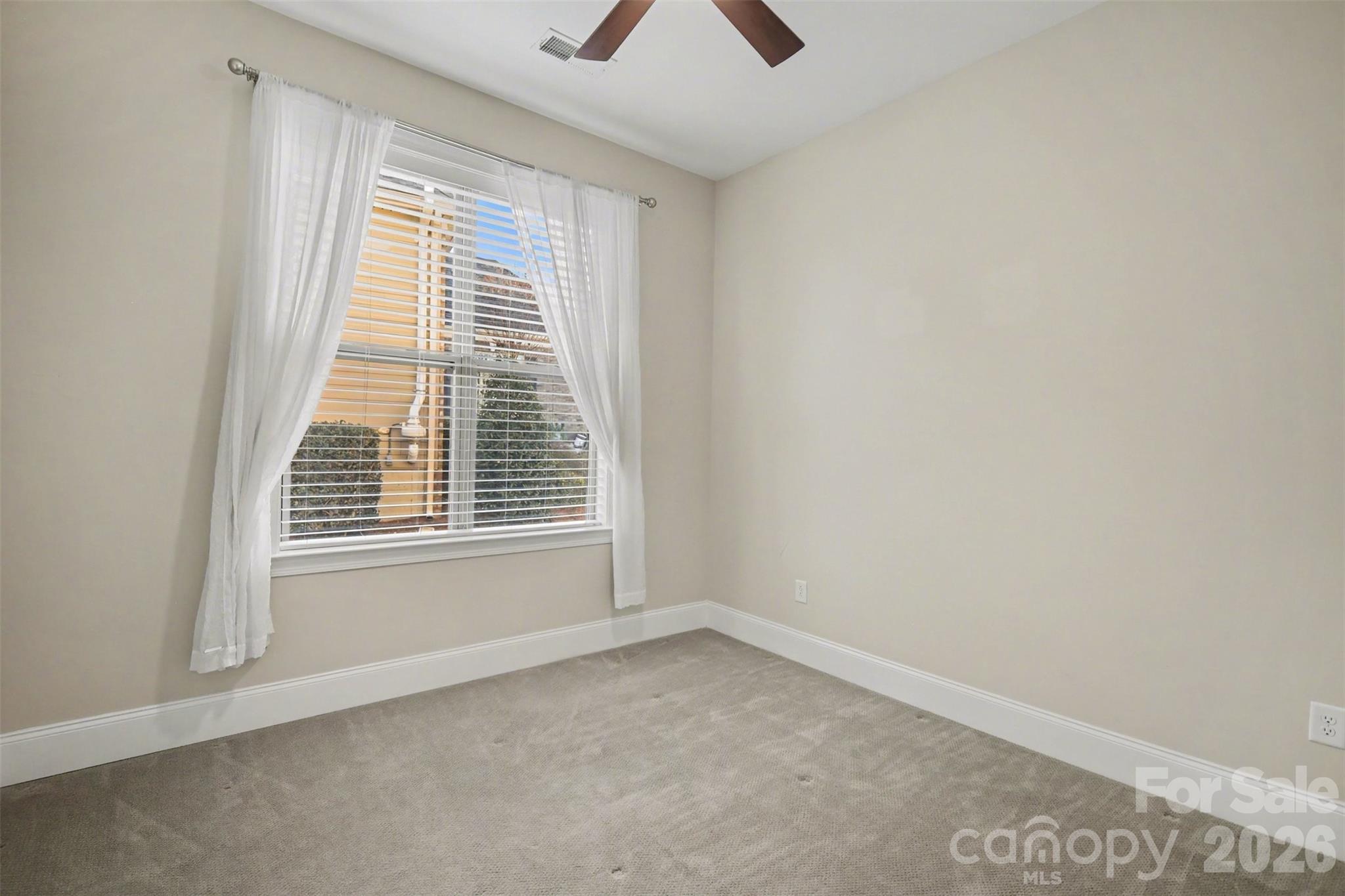 15828 Vale Ridge Drive Charlotte, NC 28278 - Photo 24 of 33 a view of an empty room with a window