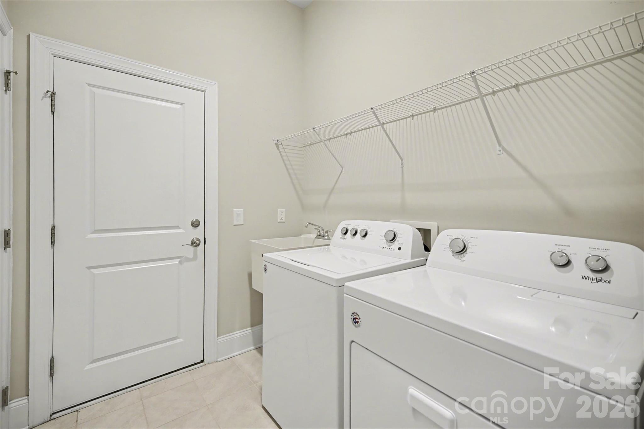 15828 Vale Ridge Drive Charlotte, NC 28278 - Photo 26 of 33 a utility room with dryer and washer