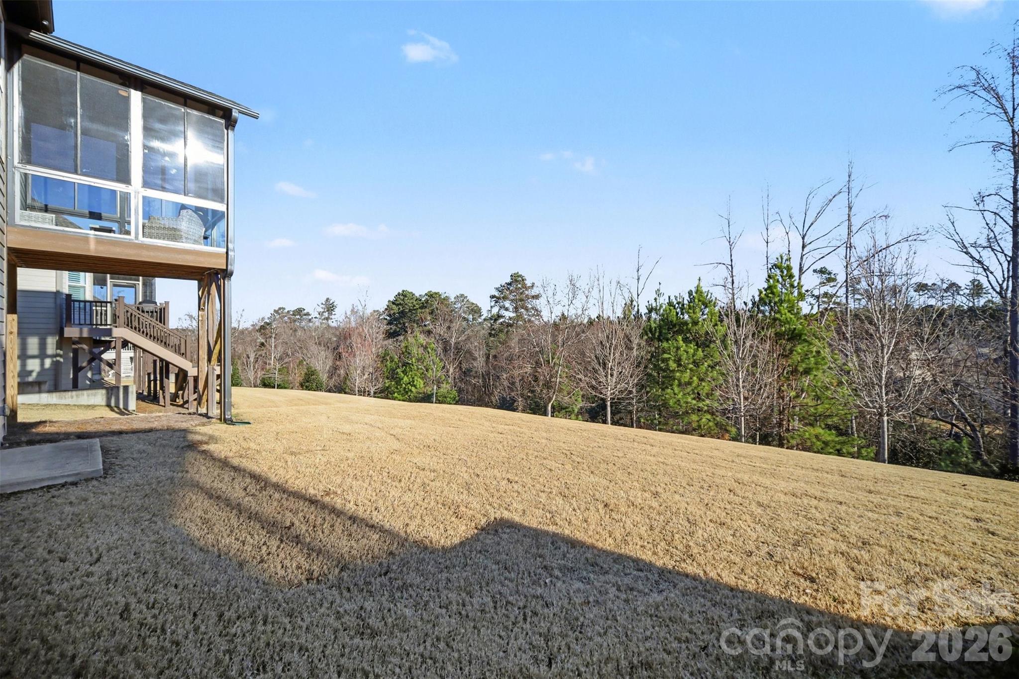 15828 Vale Ridge Drive Charlotte, NC 28278 - Photo 31 of 33 a view of a house with a yard