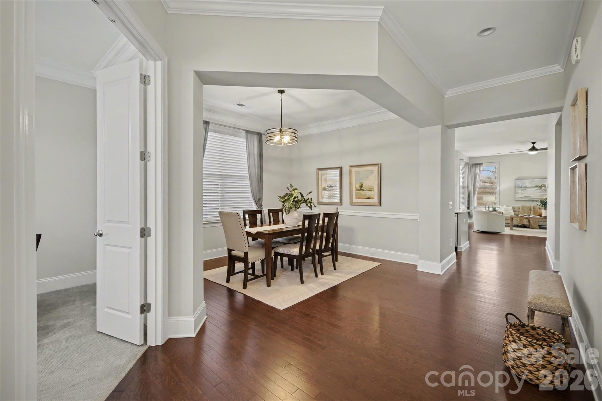15828 Vale Ridge Drive Charlotte, NC 28278 - Photo 5 of 33 a dining room with furniture and wooden floor