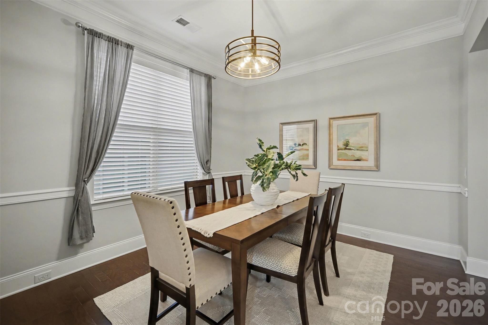15828 Vale Ridge Drive Charlotte, NC 28278 - Photo 7 of 33 a view of a dining room with furniture and wooden floor