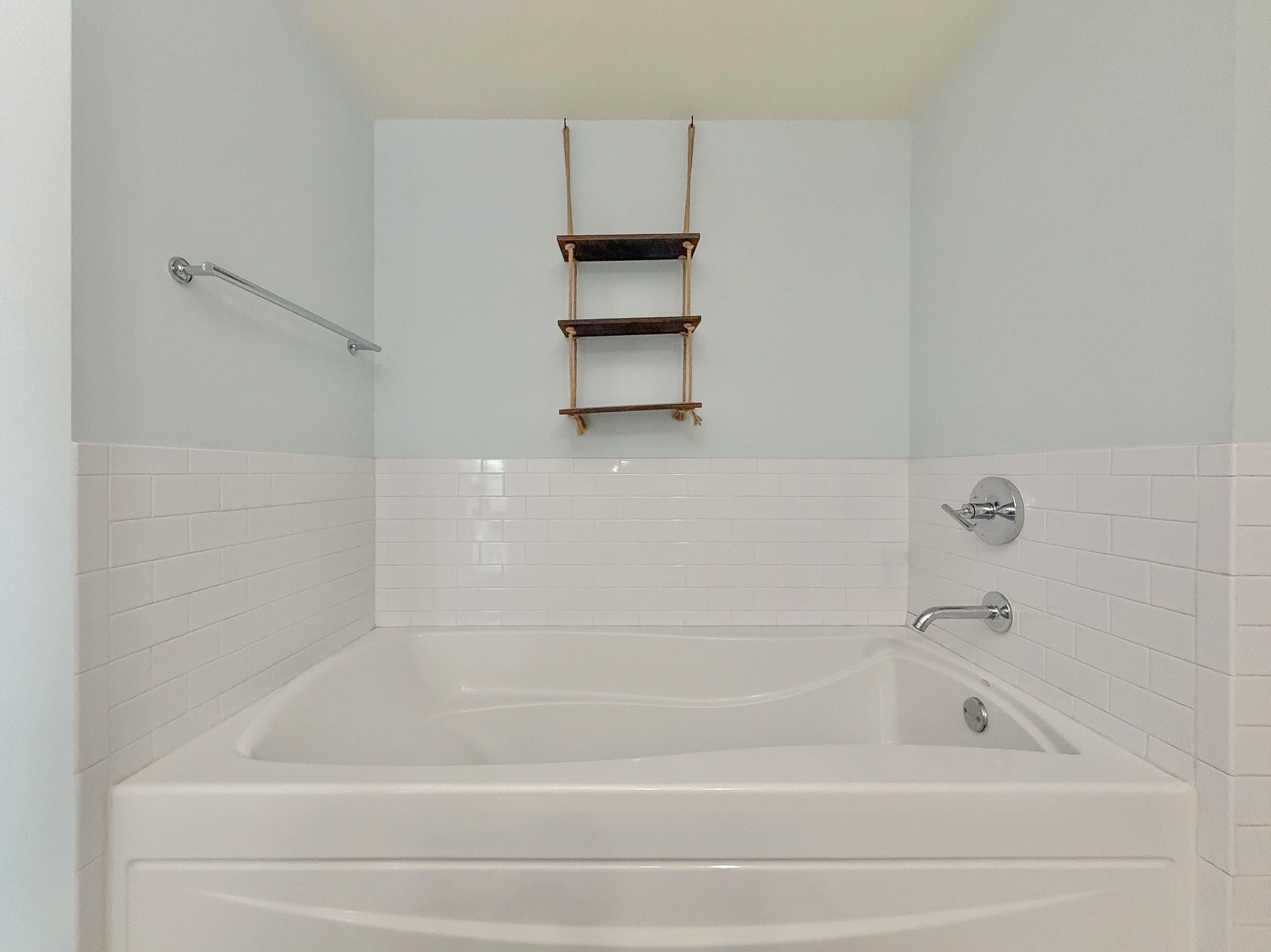 700 Grove Street, Unit 4F Jersey City, NJ 07310 - Photo 22 of 30 a bathroom with a bathtub
