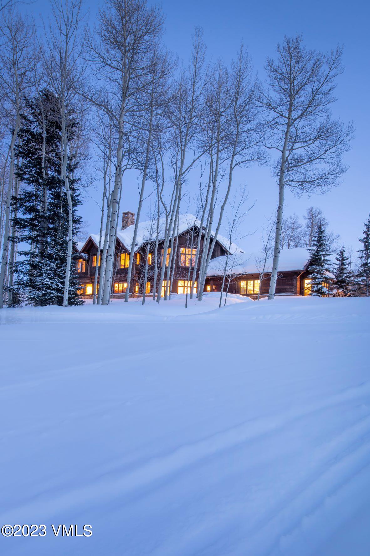 3546 Daybreak Ridge Road Avon, CO 81620 - Photo 19 of 19 a view of road with large trees