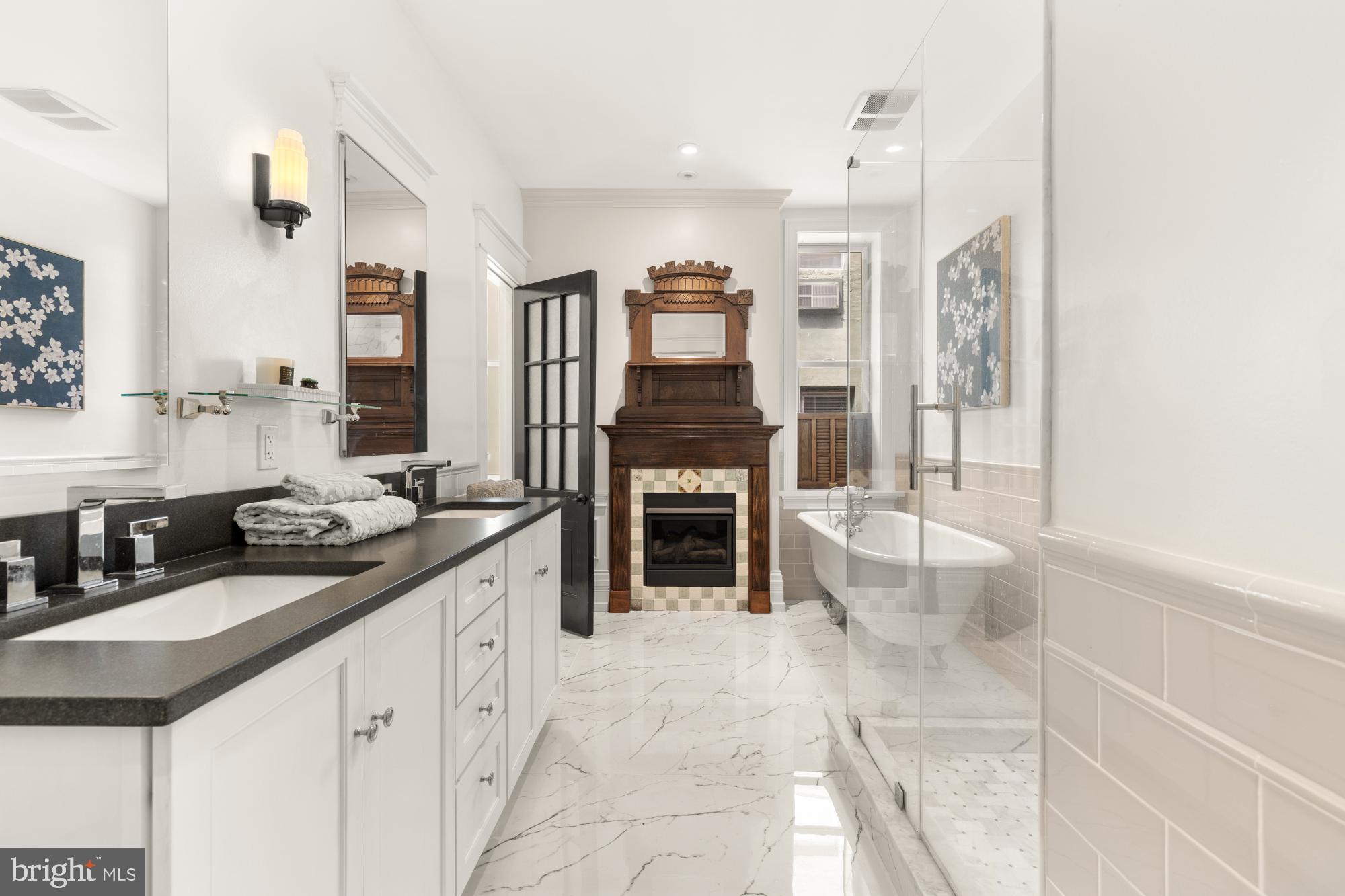 1519 Kingman Place Northwest Washington, DC 20005 - Photo 12 of 25 a large kitchen with a sink and chairs