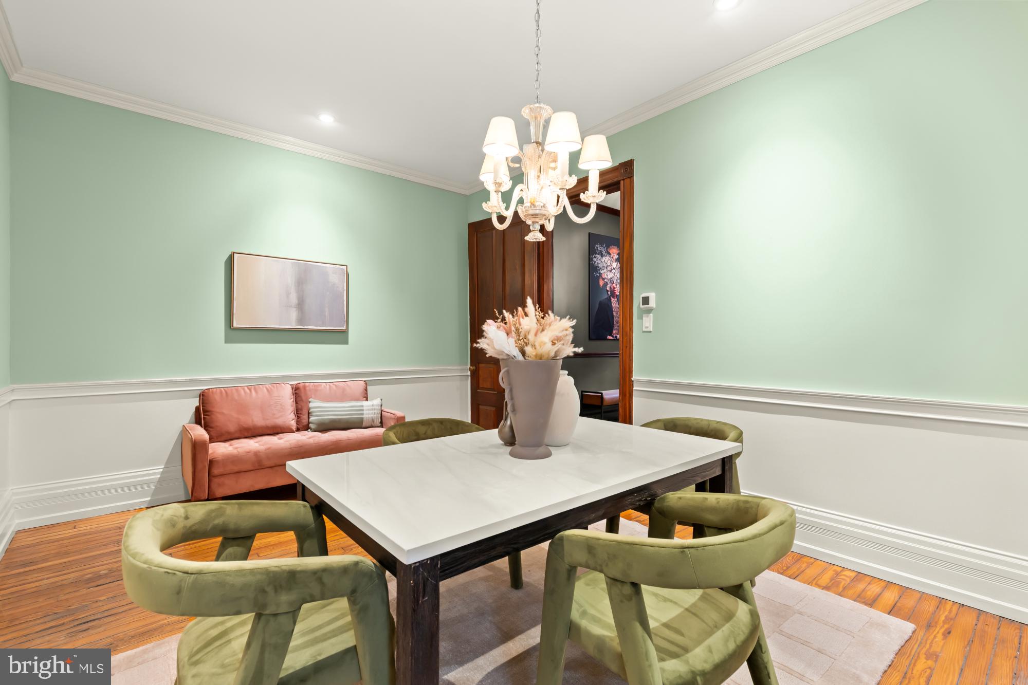 1519 Kingman Place Northwest Washington, DC 20005 - Photo 6 of 25 a dining room with furniture and chandelier