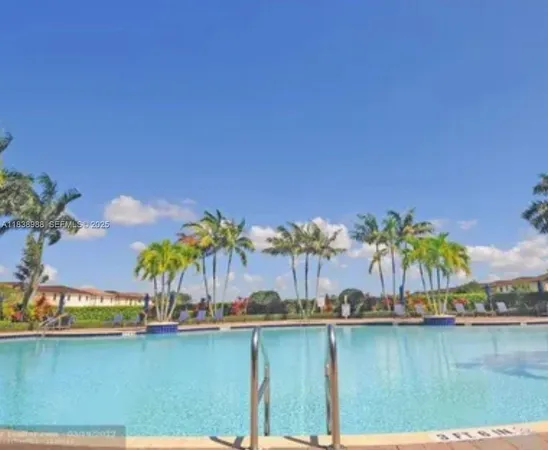 a view of a lake with a swimming pool