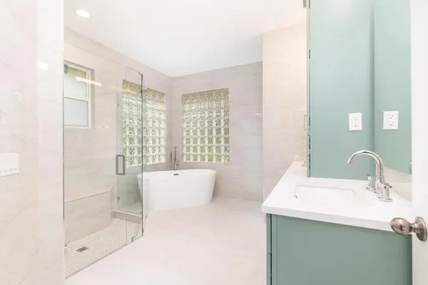 a bathroom with a sink and a bathtub