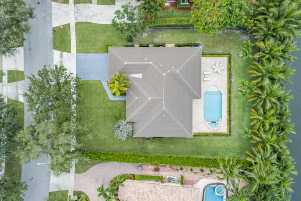 an aerial view of a house with a garden