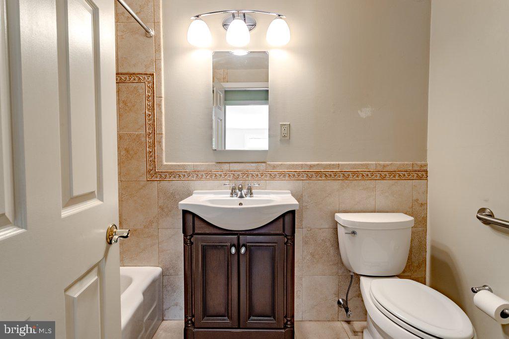 324 Wayland Road Cherry Hill, NJ 08034 - Photo 24 of 28 a bathroom with a toilet sink and mirror