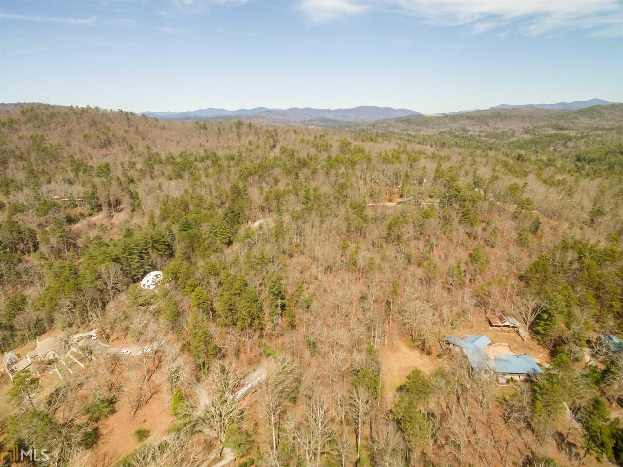 62 Oasis Road Lakemont, GA 30552 - Photo 1 of 1 a view of a mountain range with trees