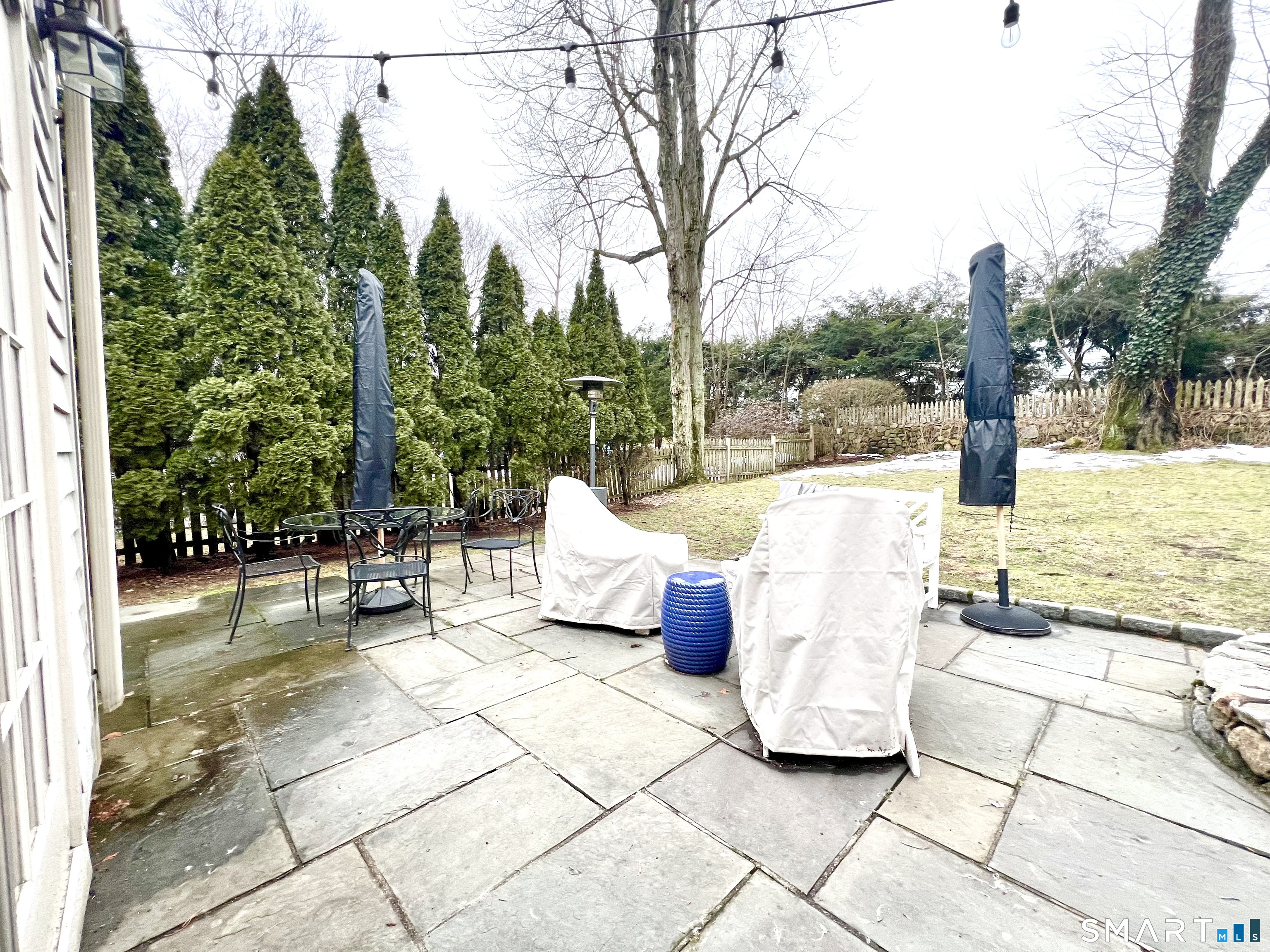 14 Laforge Road Darien, CT 06820 - Photo 13 of 35 a view of a terrace with furniture and garden