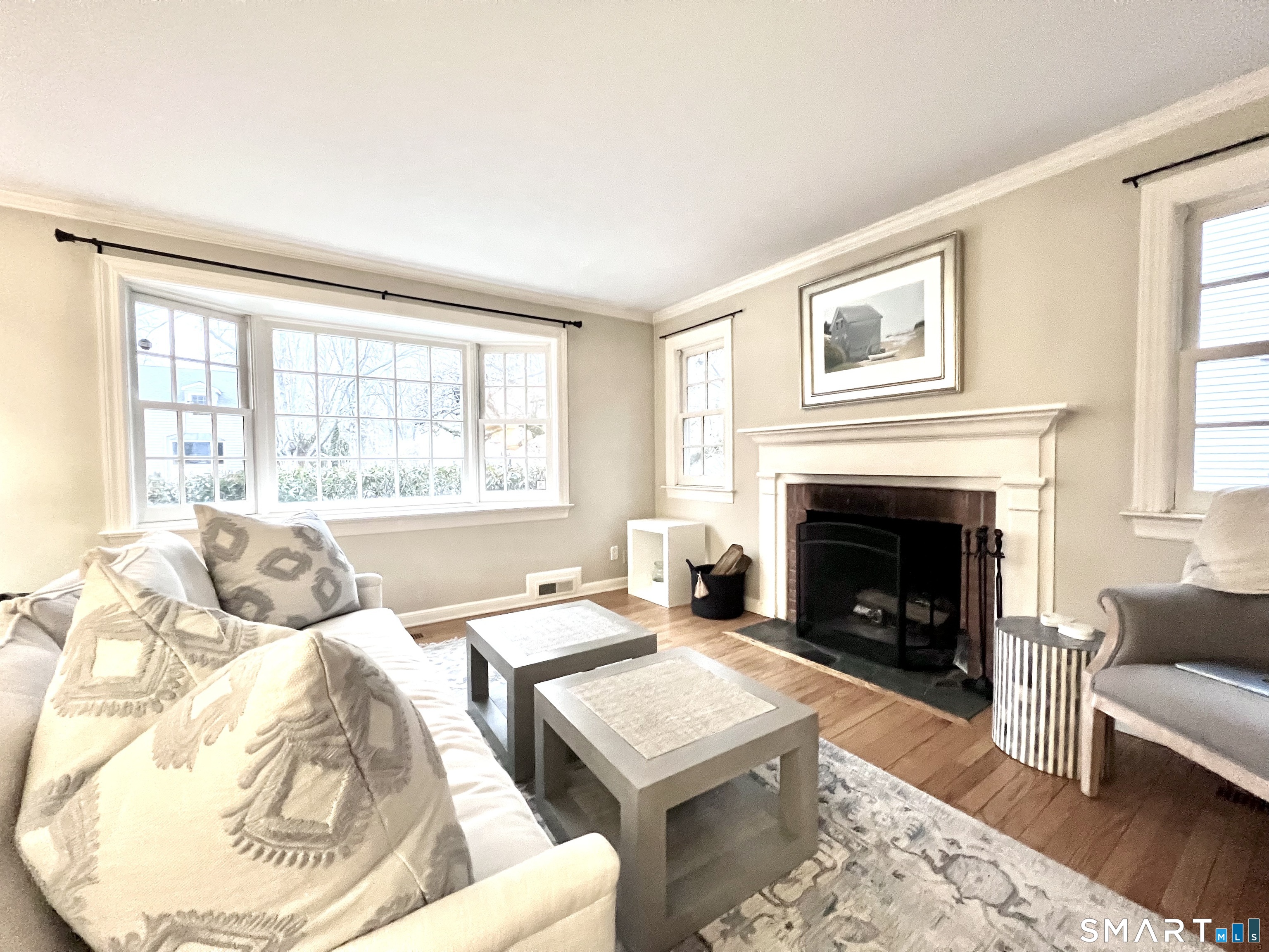 14 Laforge Road Darien, CT 06820 - Photo 3 of 35 a living room with furniture and a fireplace