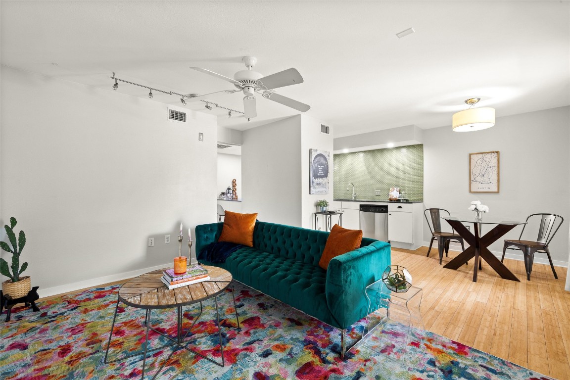 2200 Dickson Drive, Unit 108 Austin, TX 78704 - Photo 34 of 34 a living room with furniture and wooden floor