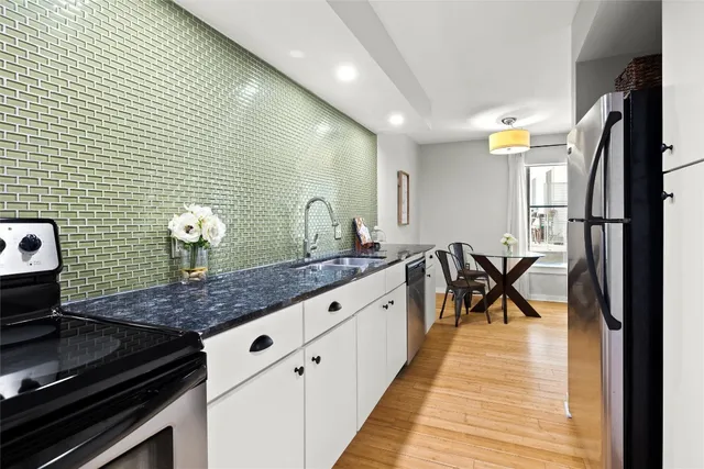 a kitchen with counter space and appliances