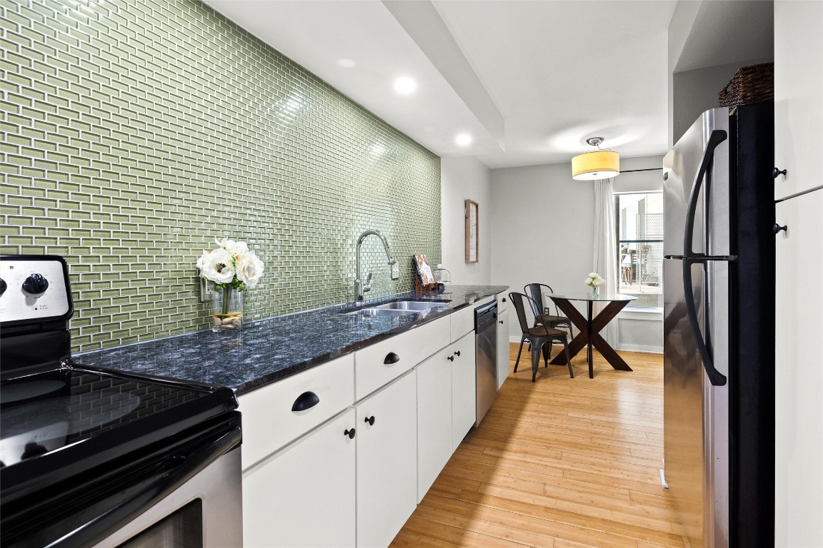 2200 Dickson Drive, Unit 108 Austin, TX 78704 - Photo 11 of 34 a kitchen with counter space and appliances
