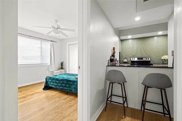 a en suite bathroom with a sink and a mirror