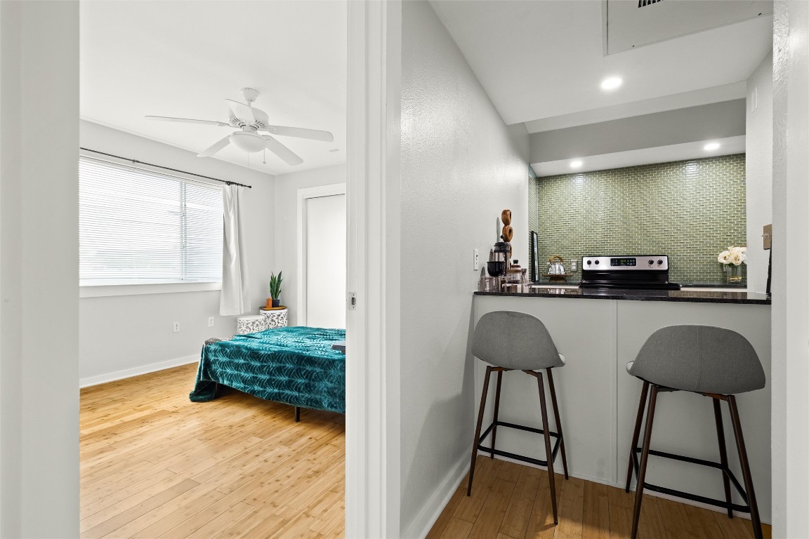 2200 Dickson Drive, Unit 108 Austin, TX 78704 - Photo 14 of 34 a en suite bathroom with a sink and a mirror