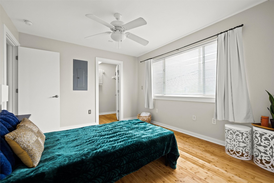 2200 Dickson Drive, Unit 108 Austin, TX 78704 - Photo 16 of 34 a bedroom with a large bed and a window