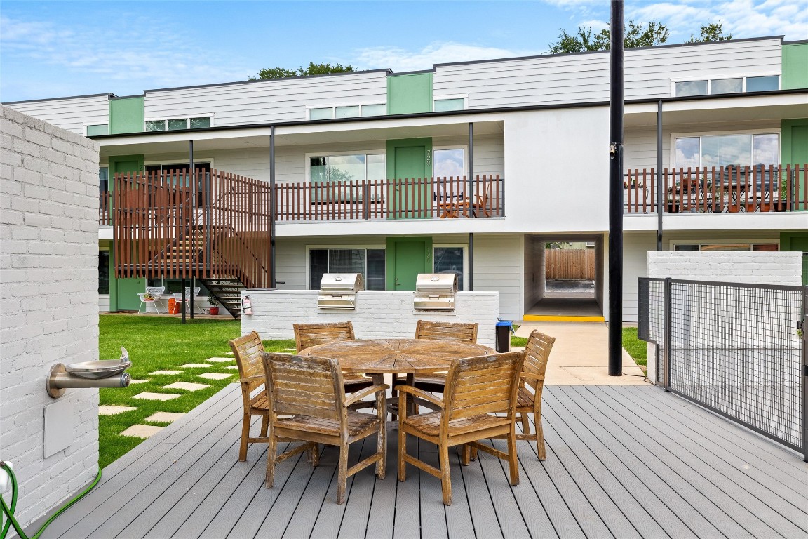 2200 Dickson Drive, Unit 108 Austin, TX 78704 - Photo 23 of 34 a view of a table and chairs on the roof deck