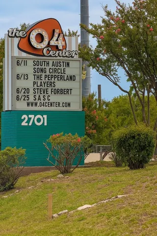 a view of a store with parking space