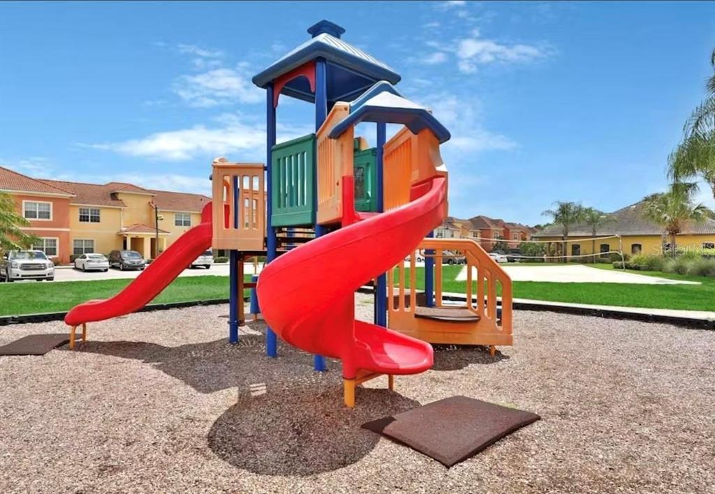 8975 Candy Palm Road Kissimmee, FL 34747 - Photo 27 of 27 a view of a park with slide