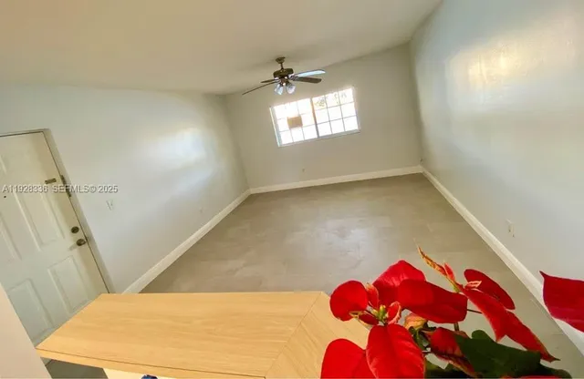 a view of a kitchen with a sink