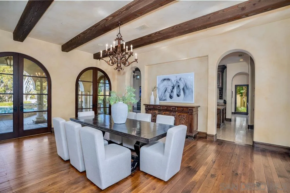 7748 Rd To Zanzibar San Diego, CA 92127 - Photo 4 of 32 a living room with fireplace furniture and wooden floor