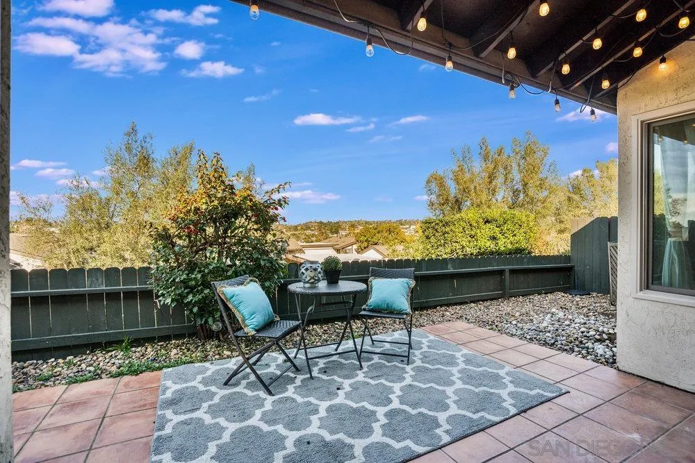 749 Nob Circle Vista, CA 92084 - Photo 17 of 23 a view of a balcony with chairs and a table