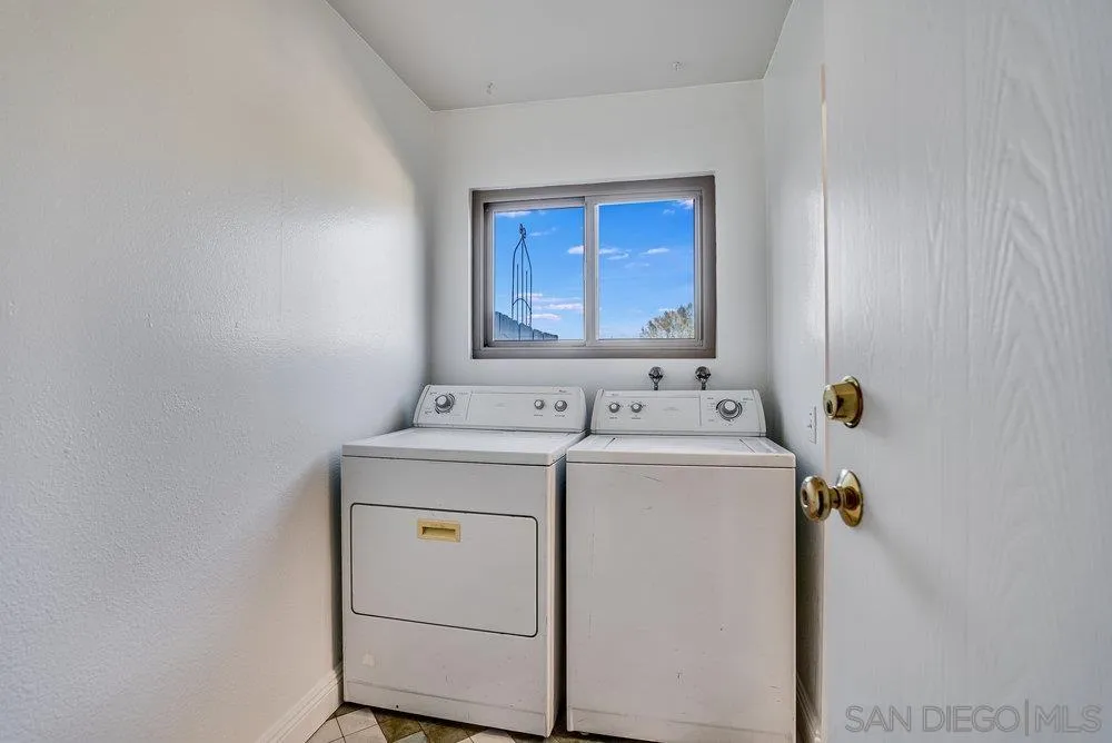 749 Nob Circle Vista, CA 92084 - Photo 19 of 23 a utility room with dryer and washer