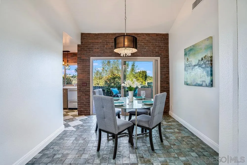 749 Nob Circle Vista, CA 92084 - Photo 6 of 23 a dining room with furniture and window
