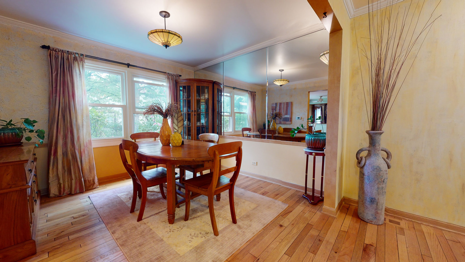 1245 Dayton Road Buffalo Grove, IL 60089 - Photo 3 of 16 a view of a dining room with furniture window and wooden floor