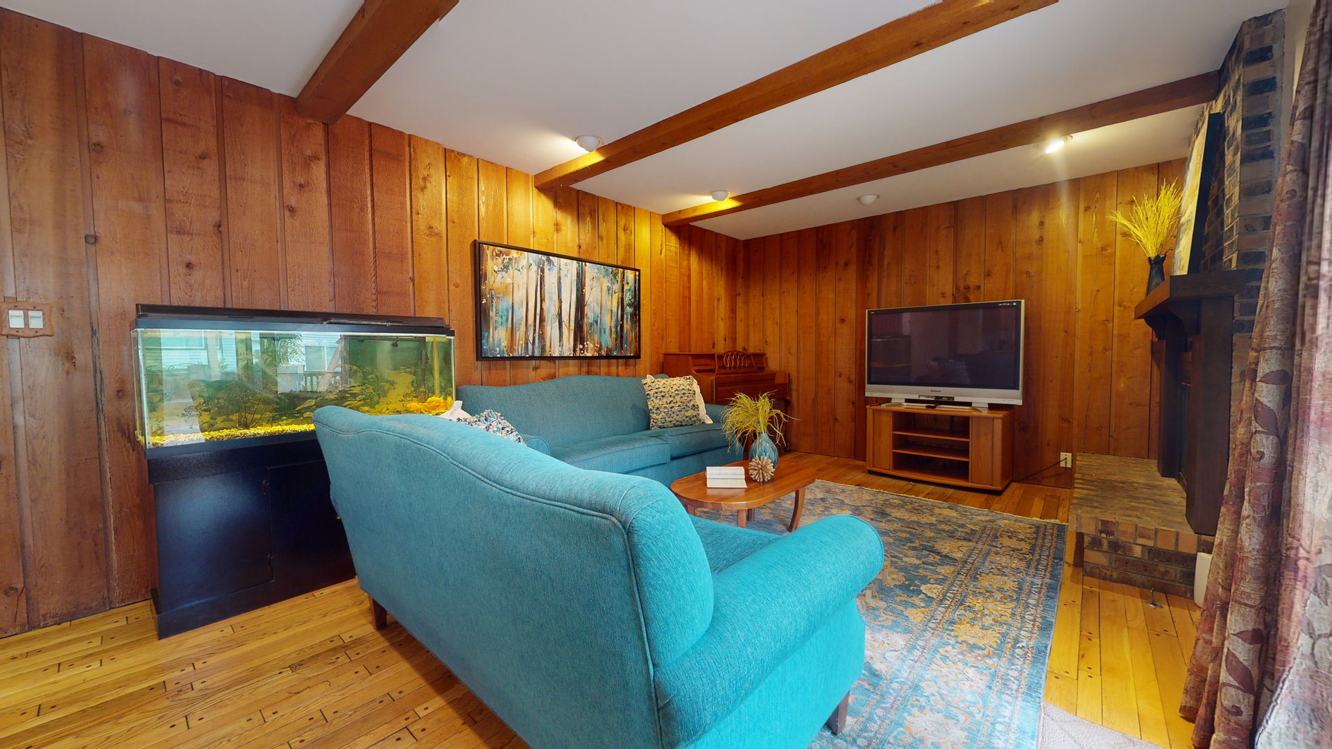 1245 Dayton Road Buffalo Grove, IL 60089 - Photo 5 of 16 a living room with furniture a flat screen tv and a window