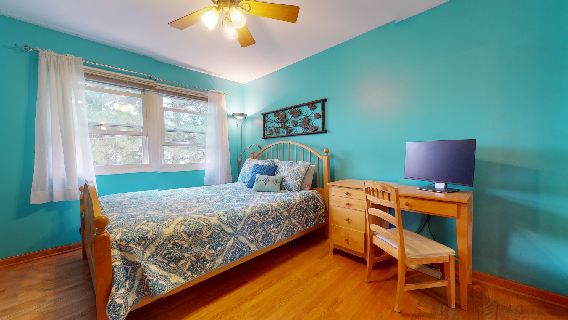 1245 Dayton Road Buffalo Grove, IL 60089 - Photo 10 of 16 a bedroom with a bed and a chandelier