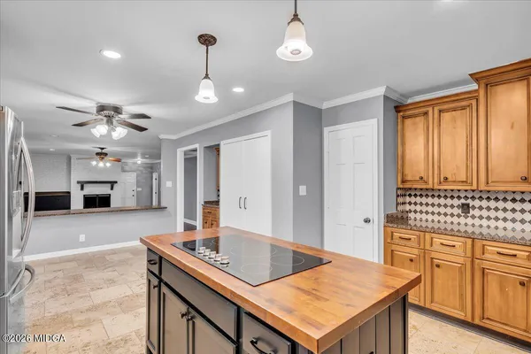 a view of livingroom with kitchen and bathroom