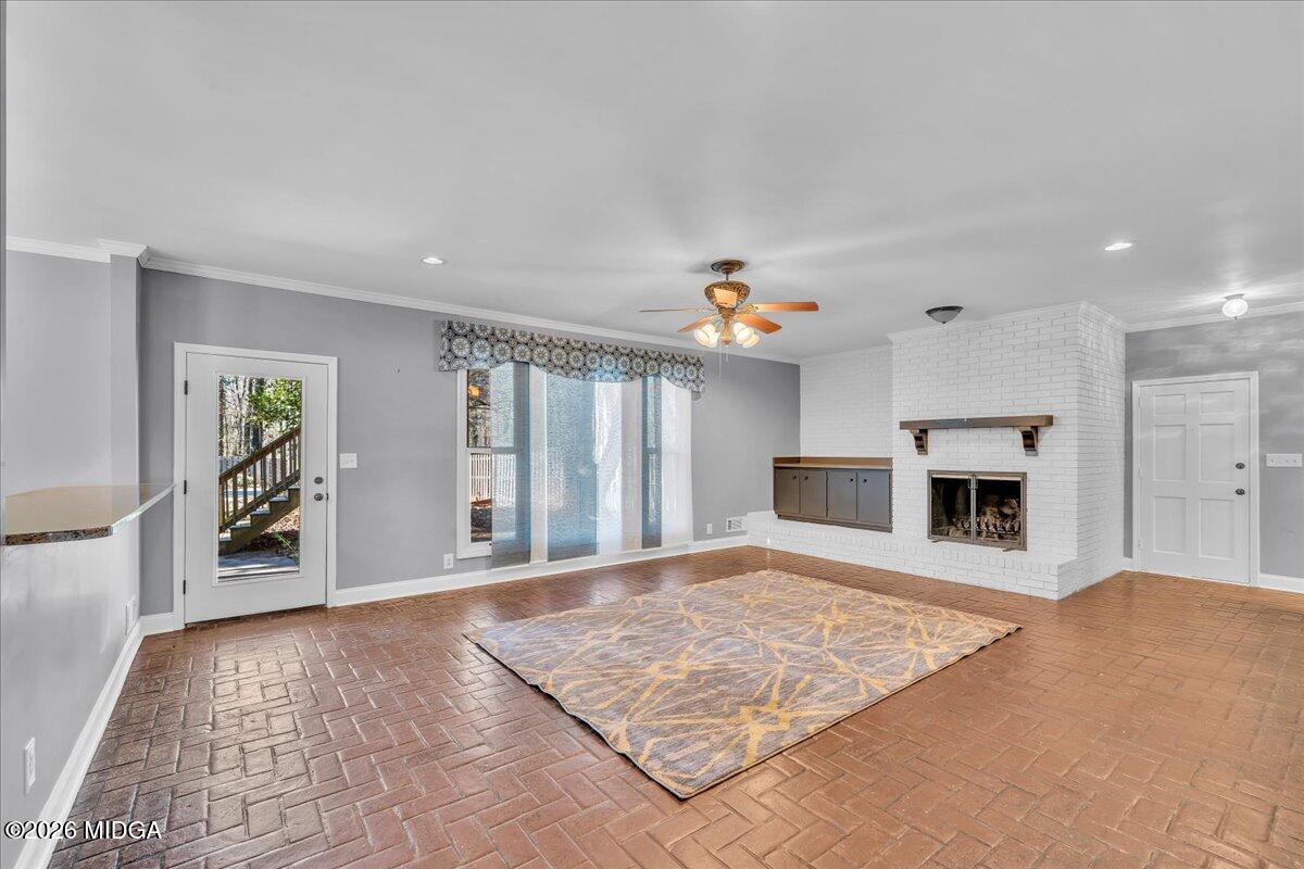 5256 Rivoli Drive Macon, GA 31210 - Photo 25 of 91 a view of an empty room with window and fireplace