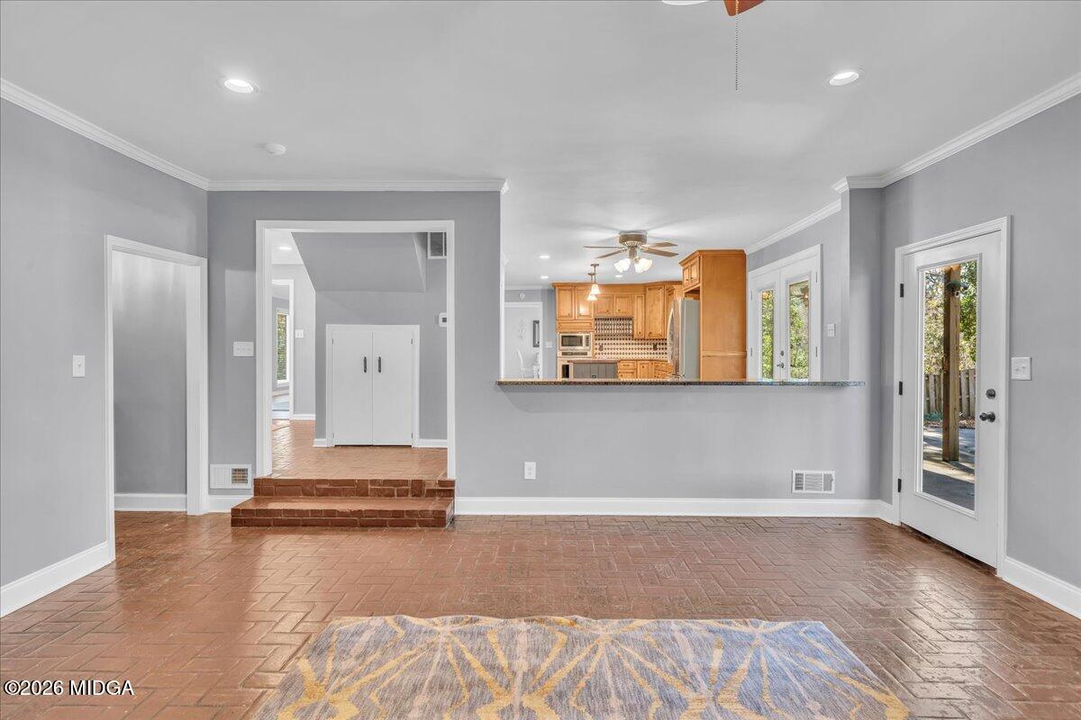 5256 Rivoli Drive Macon, GA 31210 - Photo 29 of 91 a view of a room with wooden floor and window