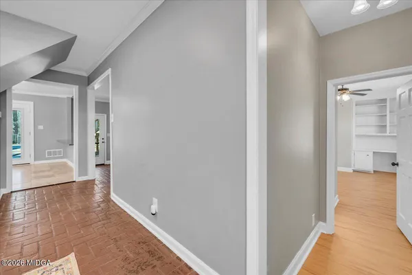 a view of an empty room with a window