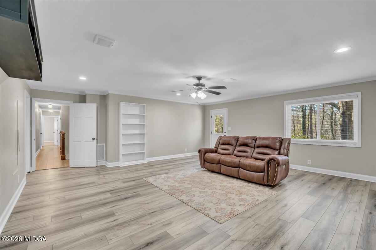 5256 Rivoli Drive Macon, GA 31210 - Photo 38 of 91 a living room with furniture and a wooden floor