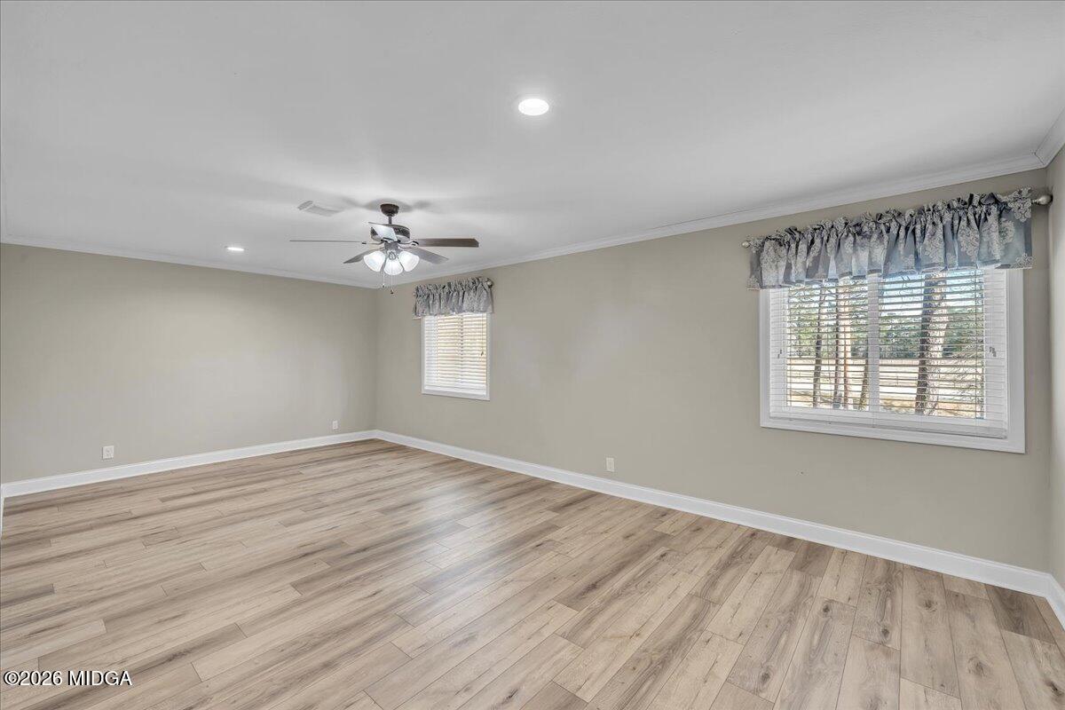 5256 Rivoli Drive Macon, GA 31210 - Photo 41 of 91 wooden floor in an empty room with a window