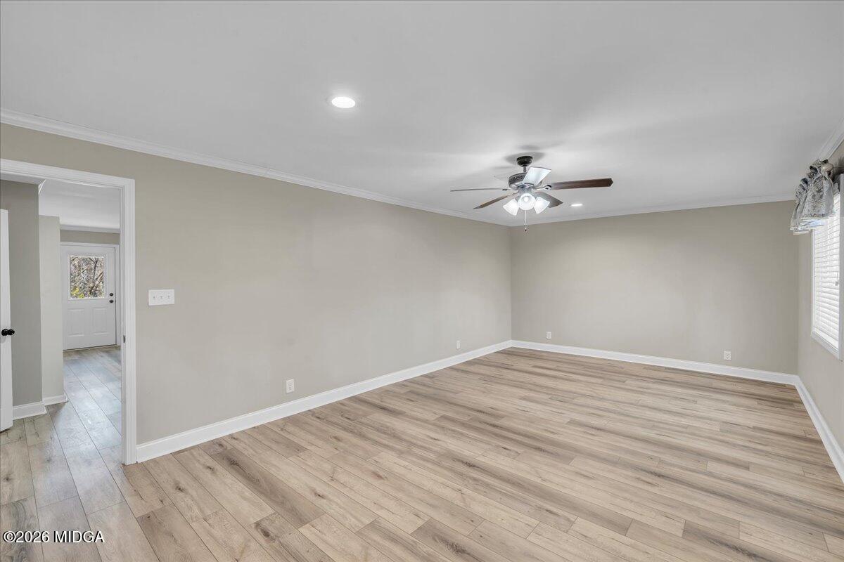 5256 Rivoli Drive Macon, GA 31210 - Photo 42 of 91 wooden floor in an empty room with a window