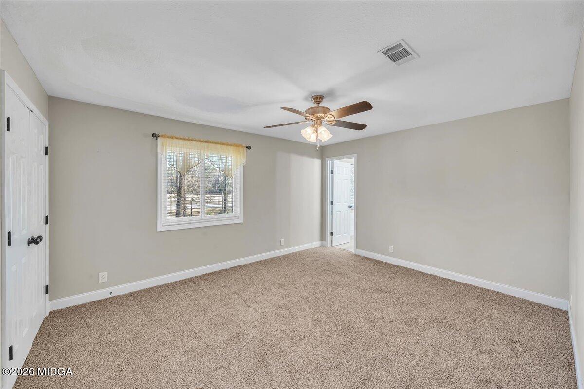 5256 Rivoli Drive Macon, GA 31210 - Photo 43 of 91 a view of an empty room with a window