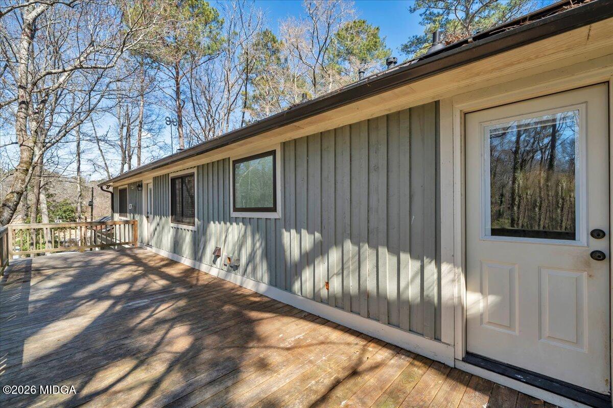 5256 Rivoli Drive Macon, GA 31210 - Photo 61 of 91 a view of backyard with a large tree and wooden fence