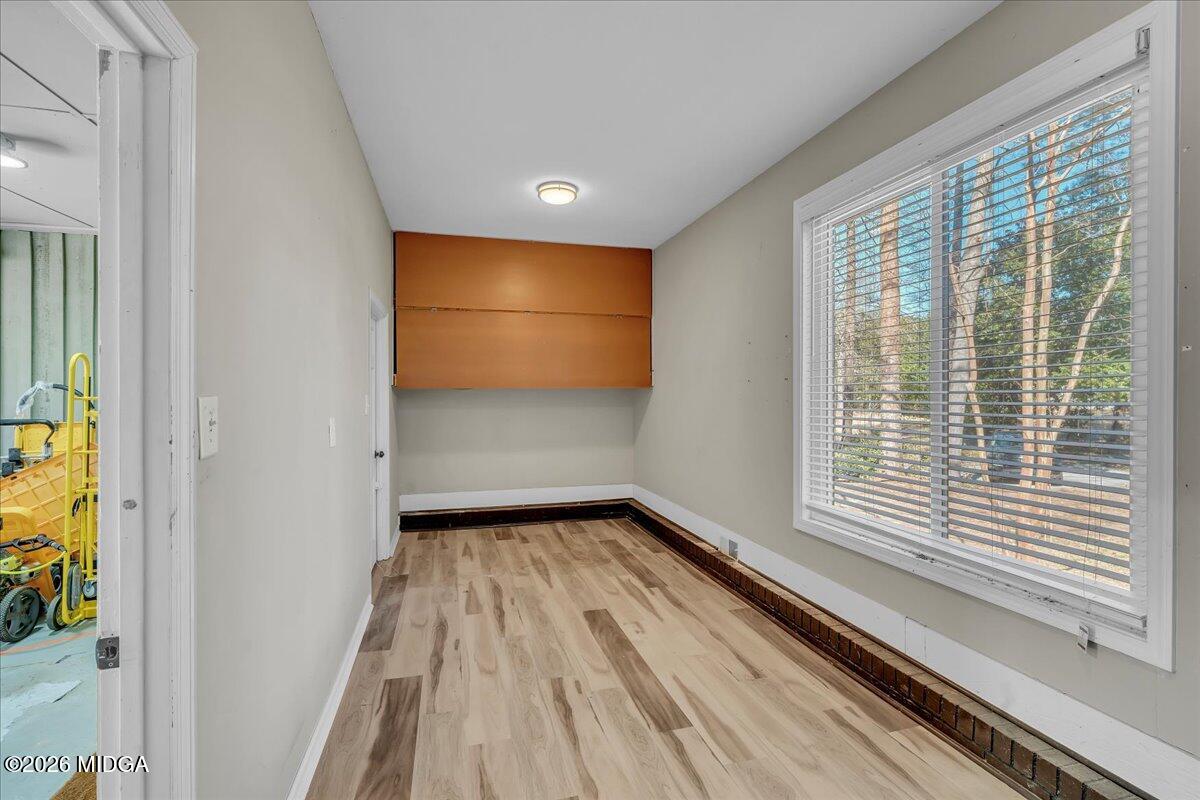 5256 Rivoli Drive Macon, GA 31210 - Photo 72 of 91 a view of a room with wooden floor and windows