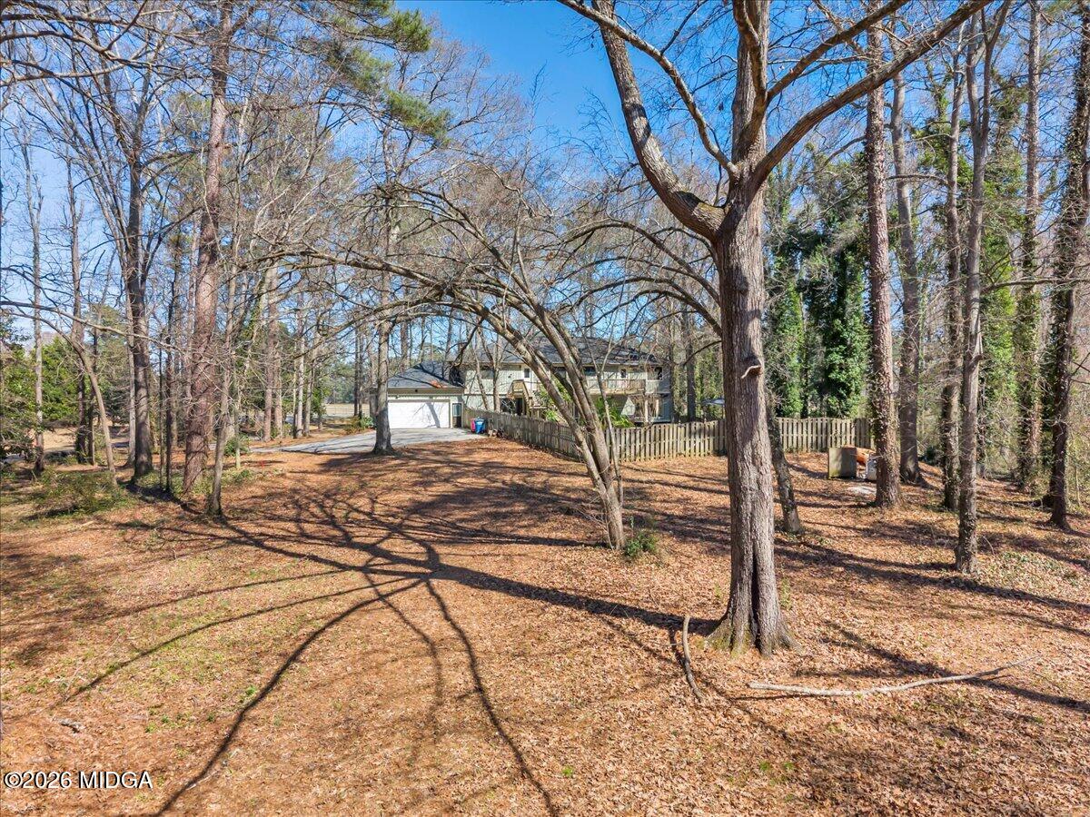 5256 Rivoli Drive Macon, GA 31210 - Photo 77 of 91 a view of a yard with wooden fence